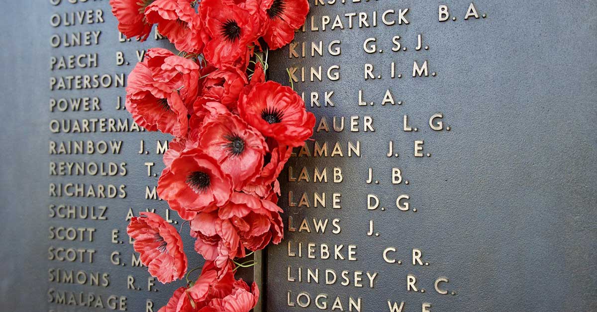 Anzac Day Poppies On Memorial